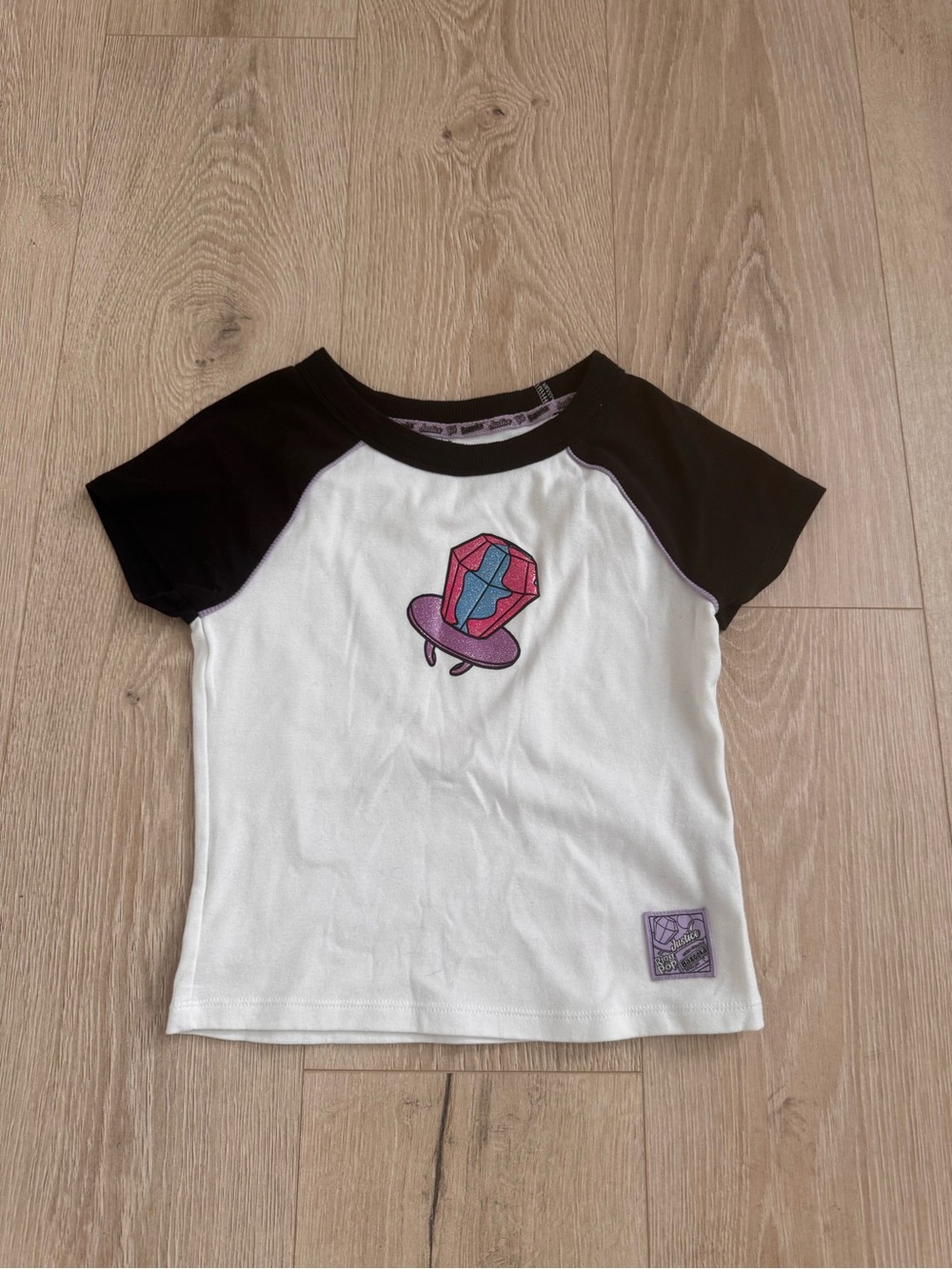 Justice White Tee with Black Raglan Sleeves and Pink/Purple Gem Graphic